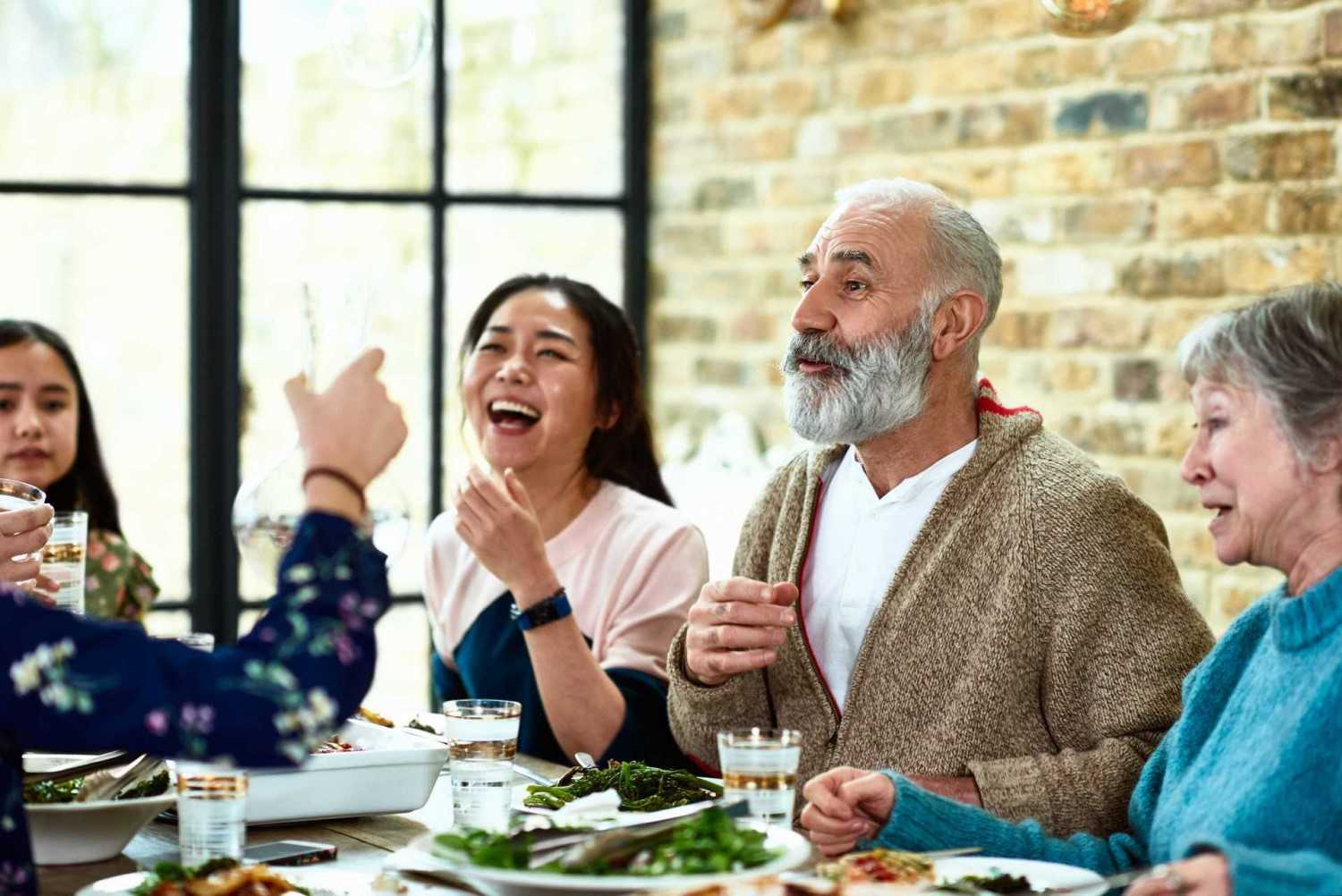 A group of people enjoying a meal together